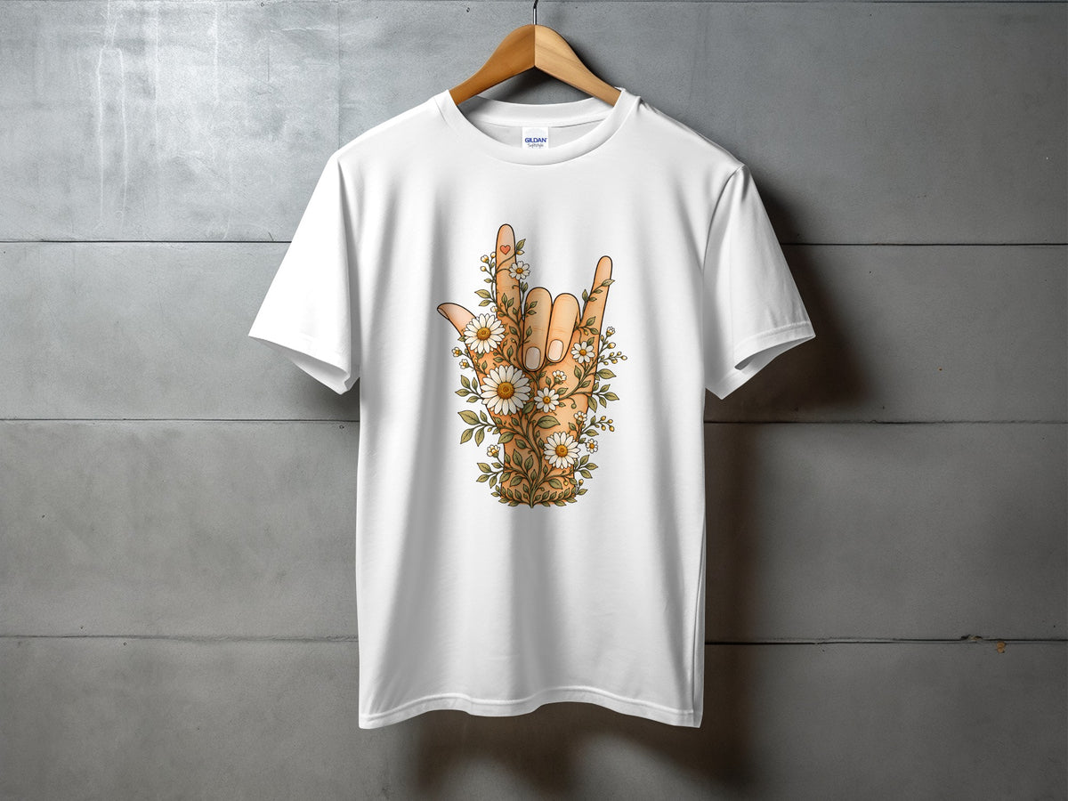 White t-shirt with a hand sign adorned with daisies and leaves.