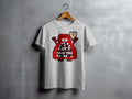 White t-shirt with cartoon monster graphic that says "I CAN'T HEAR YOU".