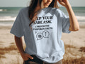 Light blue t-shirt with black text: Keep your sarcasm. I prefer the unspoken truth.