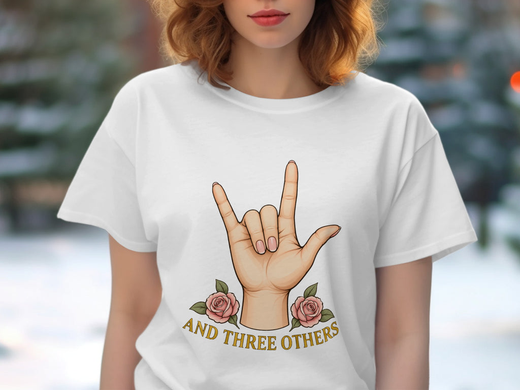White t-shirt with hand gesture, roses, and text "AND THREE OTHERS".