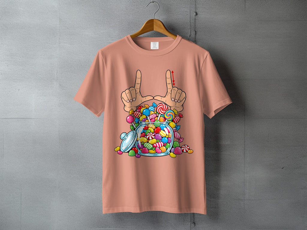 Peach t-shirt with a graphic of hands framing a jar full of colorful candies.