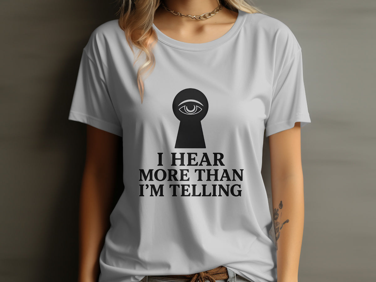 Gray t-shirt with black text and eye in keyhole graphic.