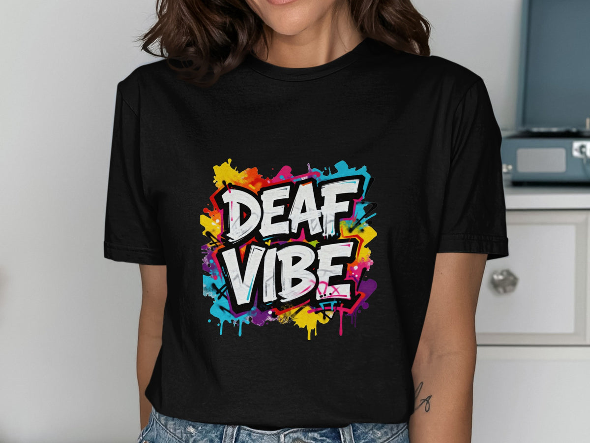 Black t-shirt with graffiti art saying "DEAF VIBE" in white and pink.