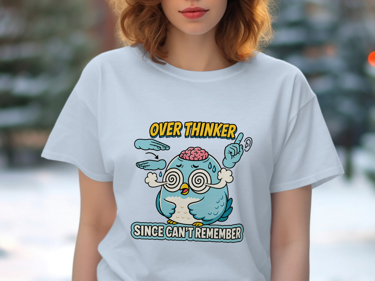 Light blue t-shirt graphic with a distressed cartoon owl saying "Over Thinker Since Can't Remember".