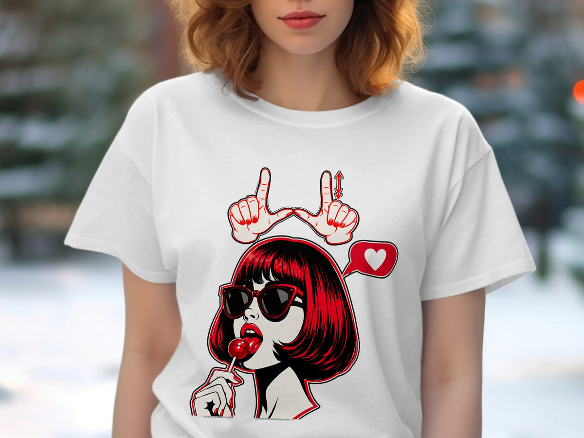 White t-shirt with graphic of woman eating lollipop, heart, and hand gesture.