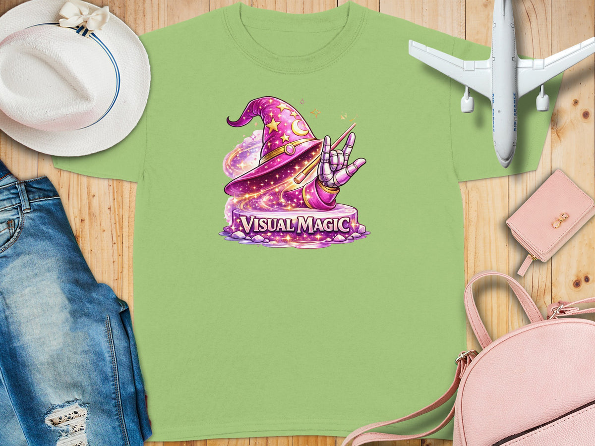 Light green t-shirt with a wizard hat, rock hand, and "Visual Magic" text graphic.