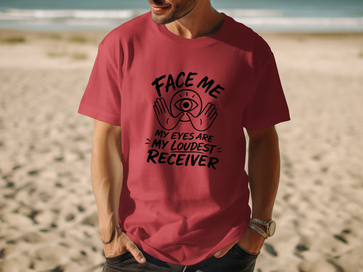 Red t-shirt with black text reading "FACE ME MY EYES ARE MY LOUDEST RECEIVER".